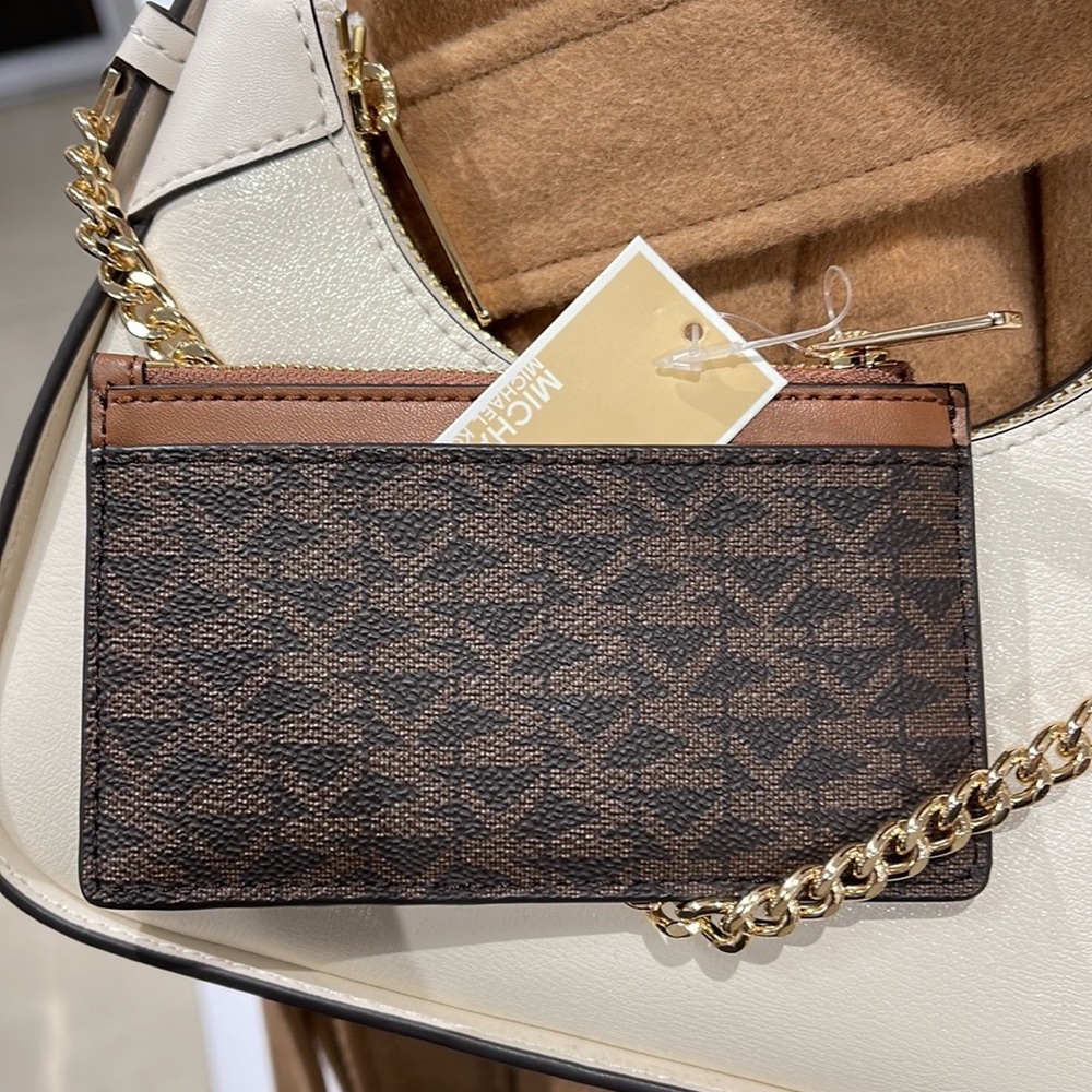 Michael Kors Jet Set Travel Medium Top Zip Card Case Wallet
PVC Leathr
Brown
NWT - Picture 12 of 16